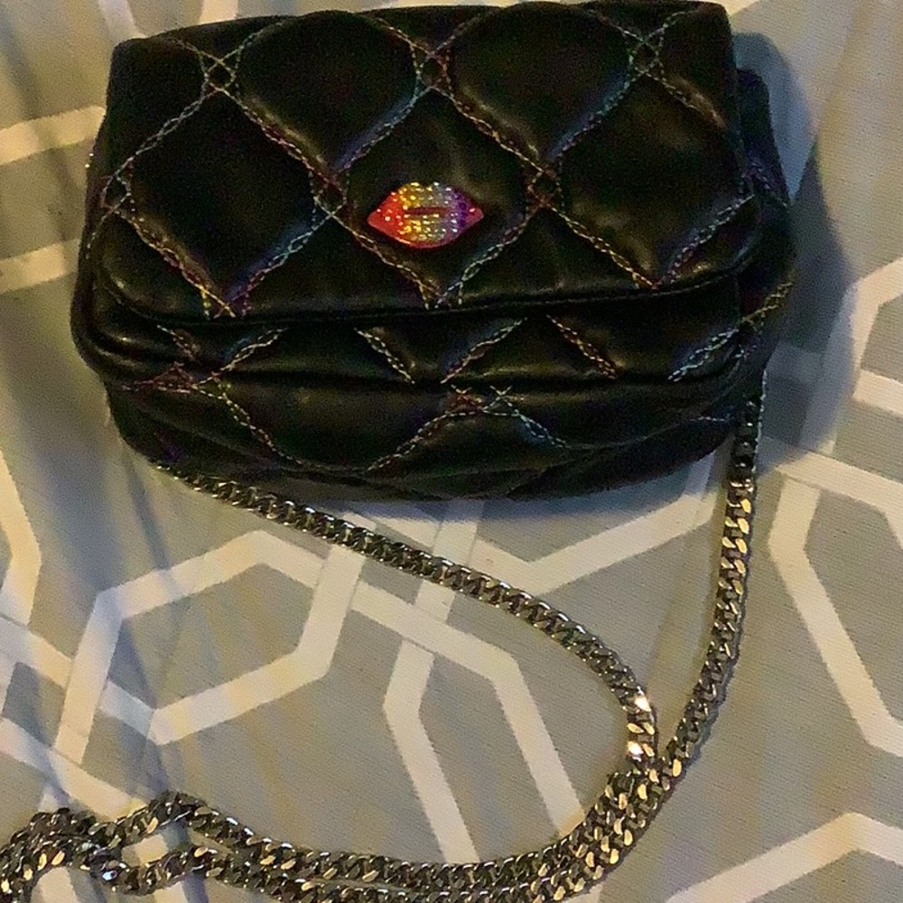 Betsey Johnson small handbag, full body or cross body metal chain strap.